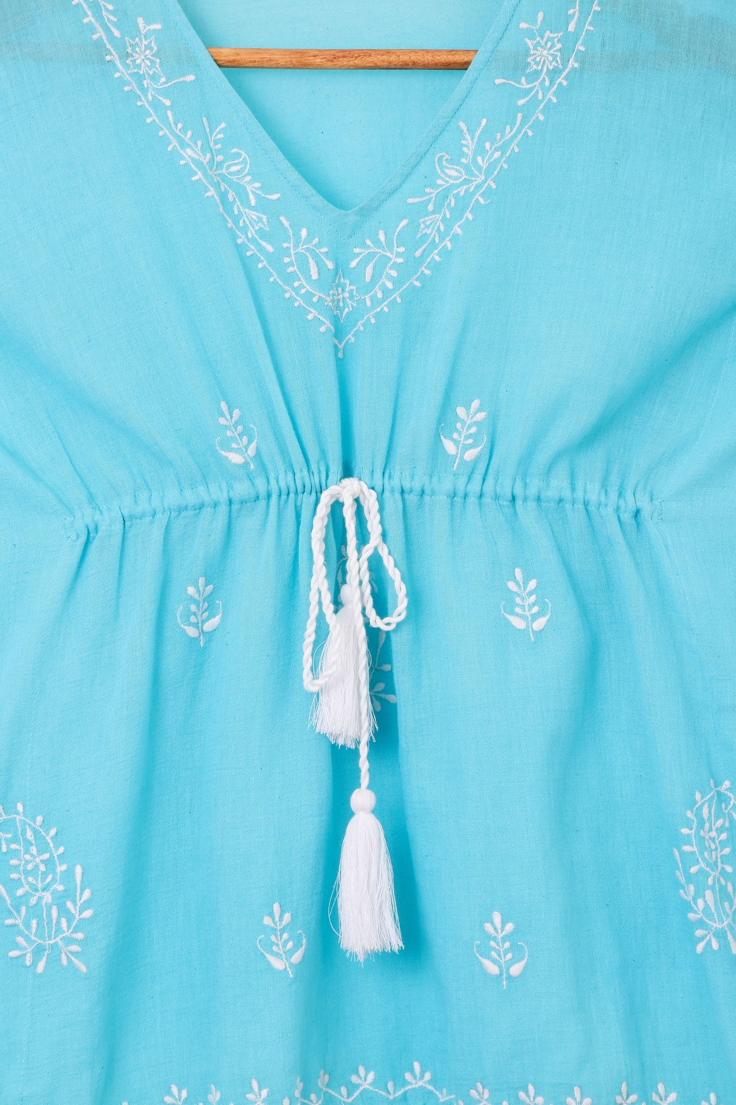 Blue And White Embroidered Kaftan With Pom Pom Detailing,Has A V Neck,Gathered And Tie-Up Detail On The Front