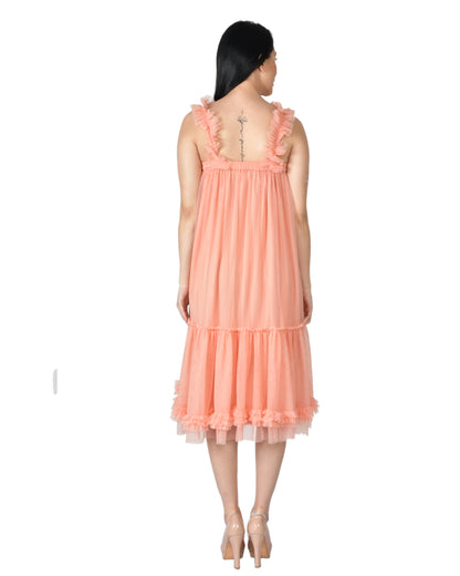 FRILLY PARTY DRESS IN A SOFT PEACH