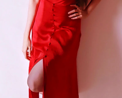 RED COWL SPAGHETTI WITH A CRISS CROSS BACK AND A FRONT SLIT BUTTONED DOWN SKIRT