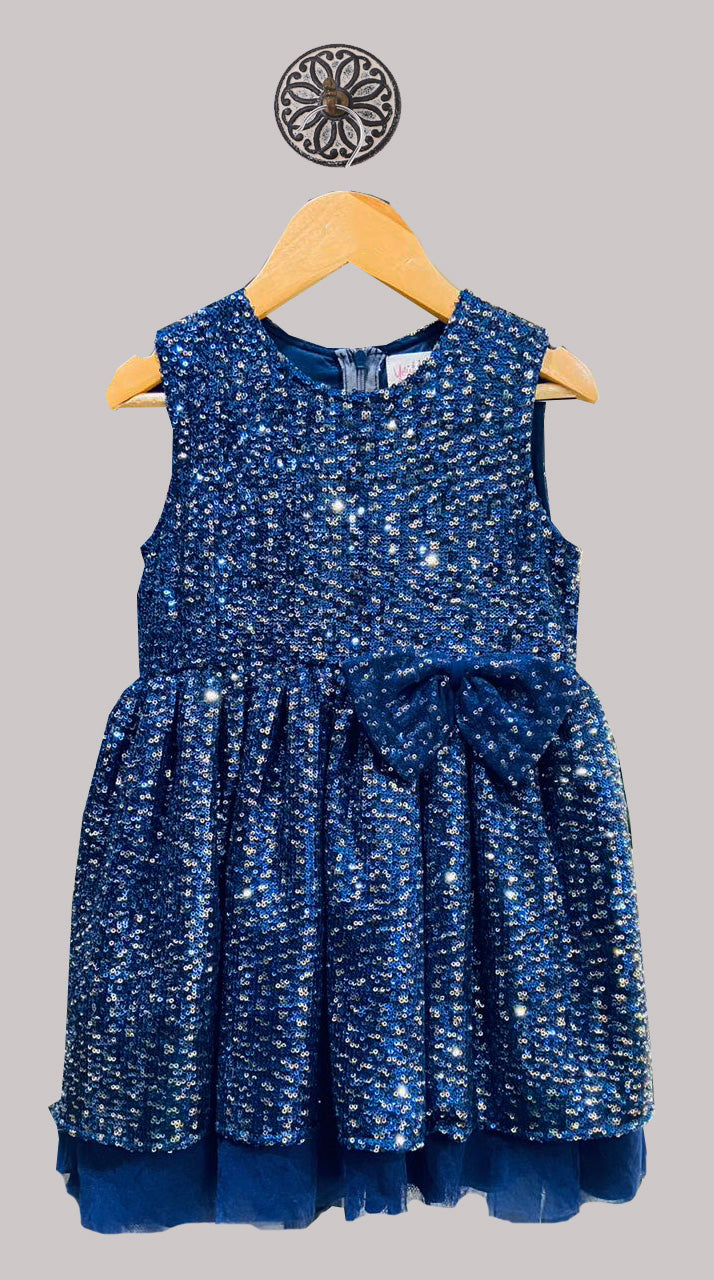 BLUE SEQUIN NET DRESS WITH A ROUND NECKLINE AND LARGE SEQUIN BOW