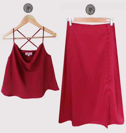 WINE COWL SPAGHETTI WITH A CRISS CROSS BACK  AND A FRONT SLIT BUTTONED DOWN SKIRT